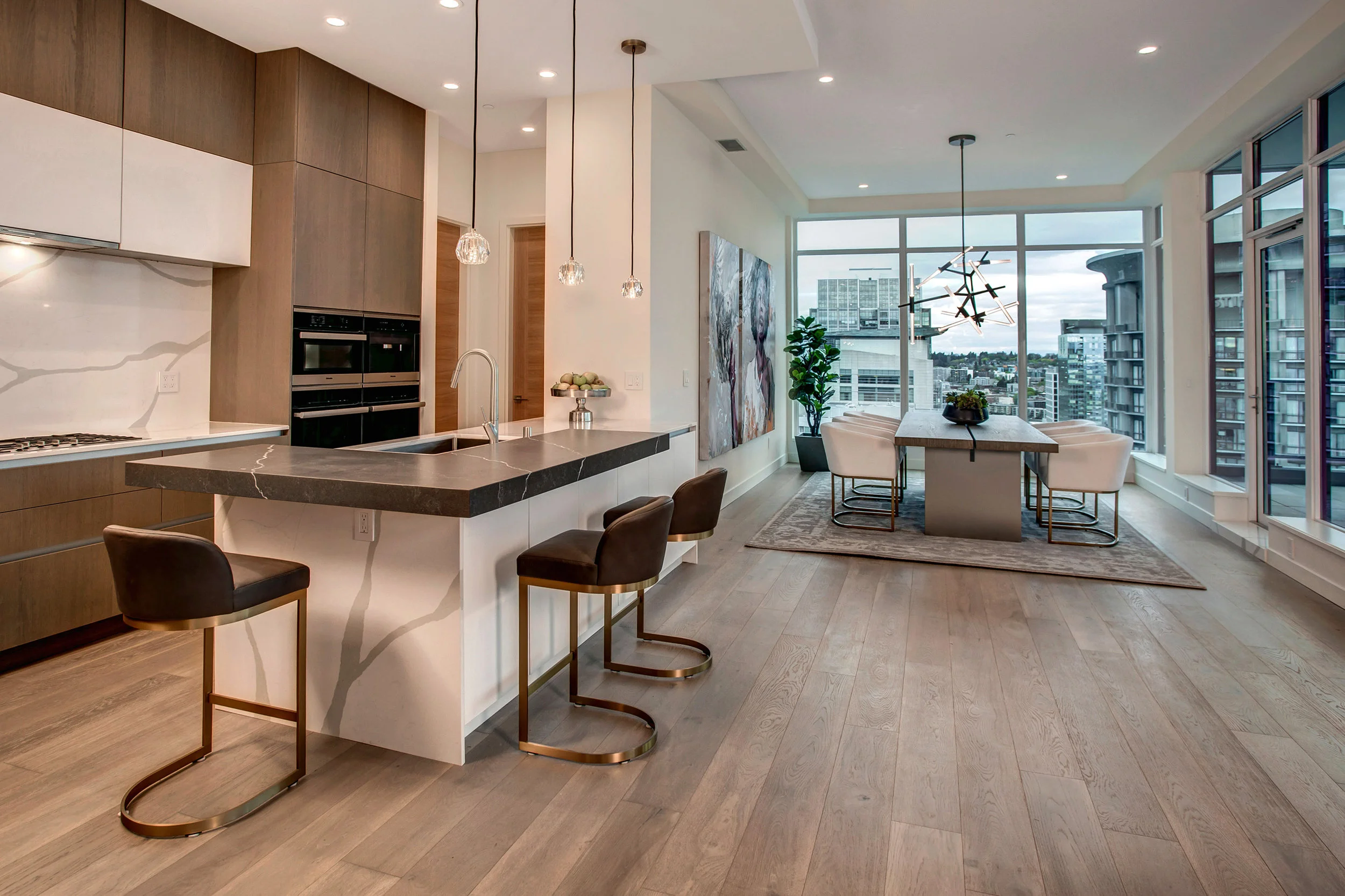 Efficient and modern kitchen with European style cabinetry.