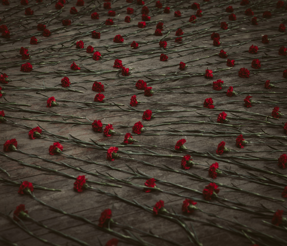 At School No.1, where flowers and stuffed animals are left commemorate those who died.