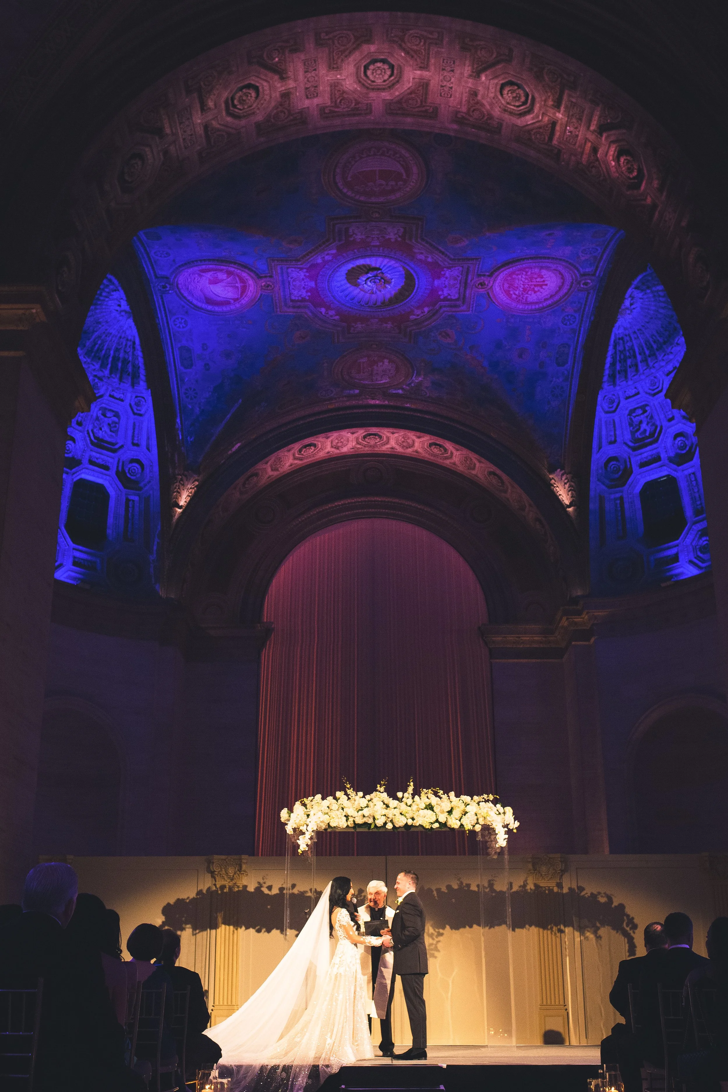 Wedding ceremony in a large room with tall ceilings NYC