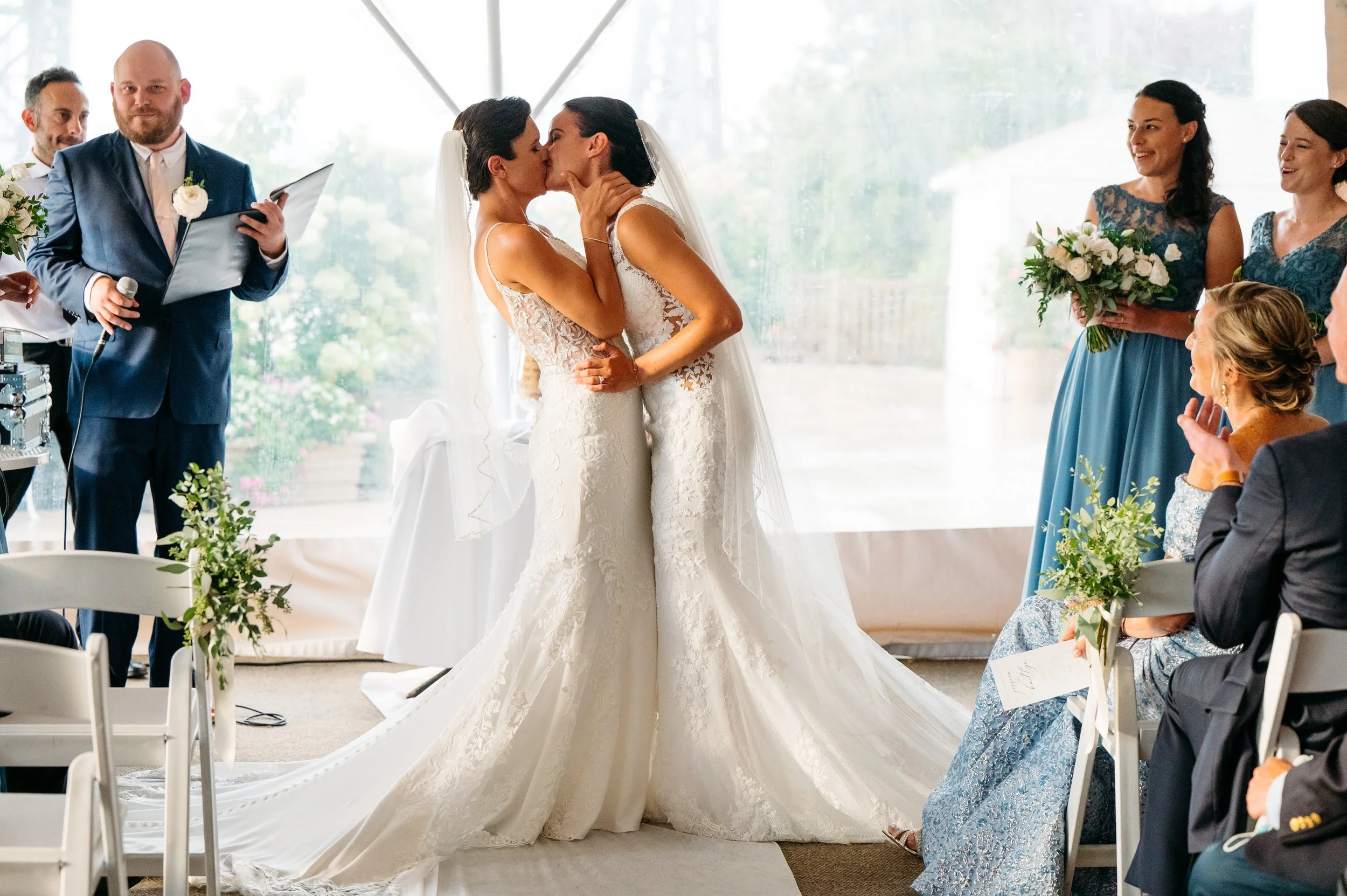 Brides first kiss at their wedding ceremony