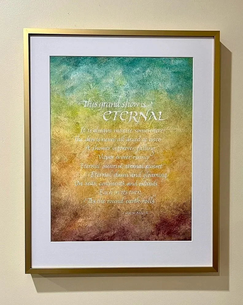 John Muir quote calligraphy on acrylic painted background