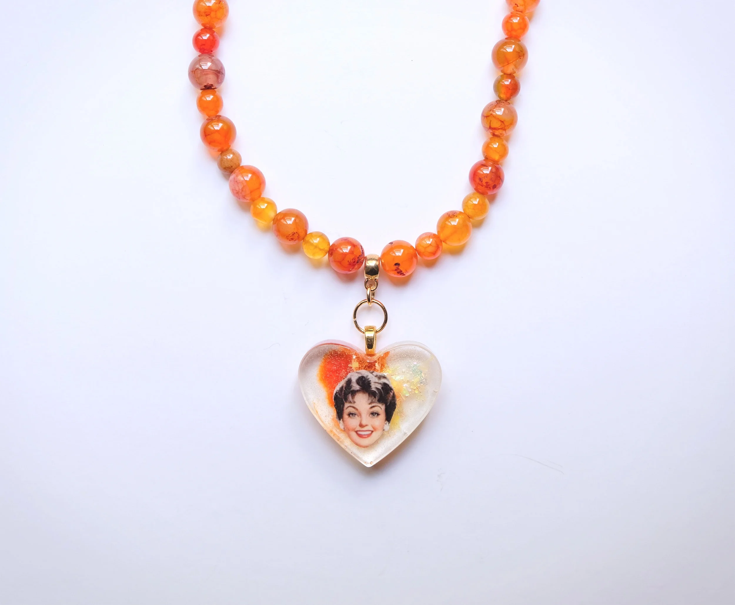 JOYA+CORAZO%CC%81N+SEN%CC%83ORA+NARANJA+CLOSE.jpg