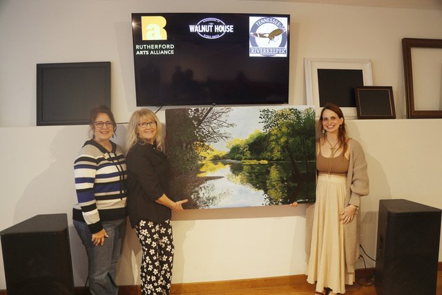 Susan Gulley, Pam Mack, and Molly Steen with Molly’s painting