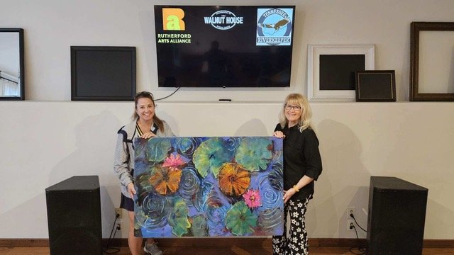  Lisa Sims and Pam Mack with Lisa’s painting 