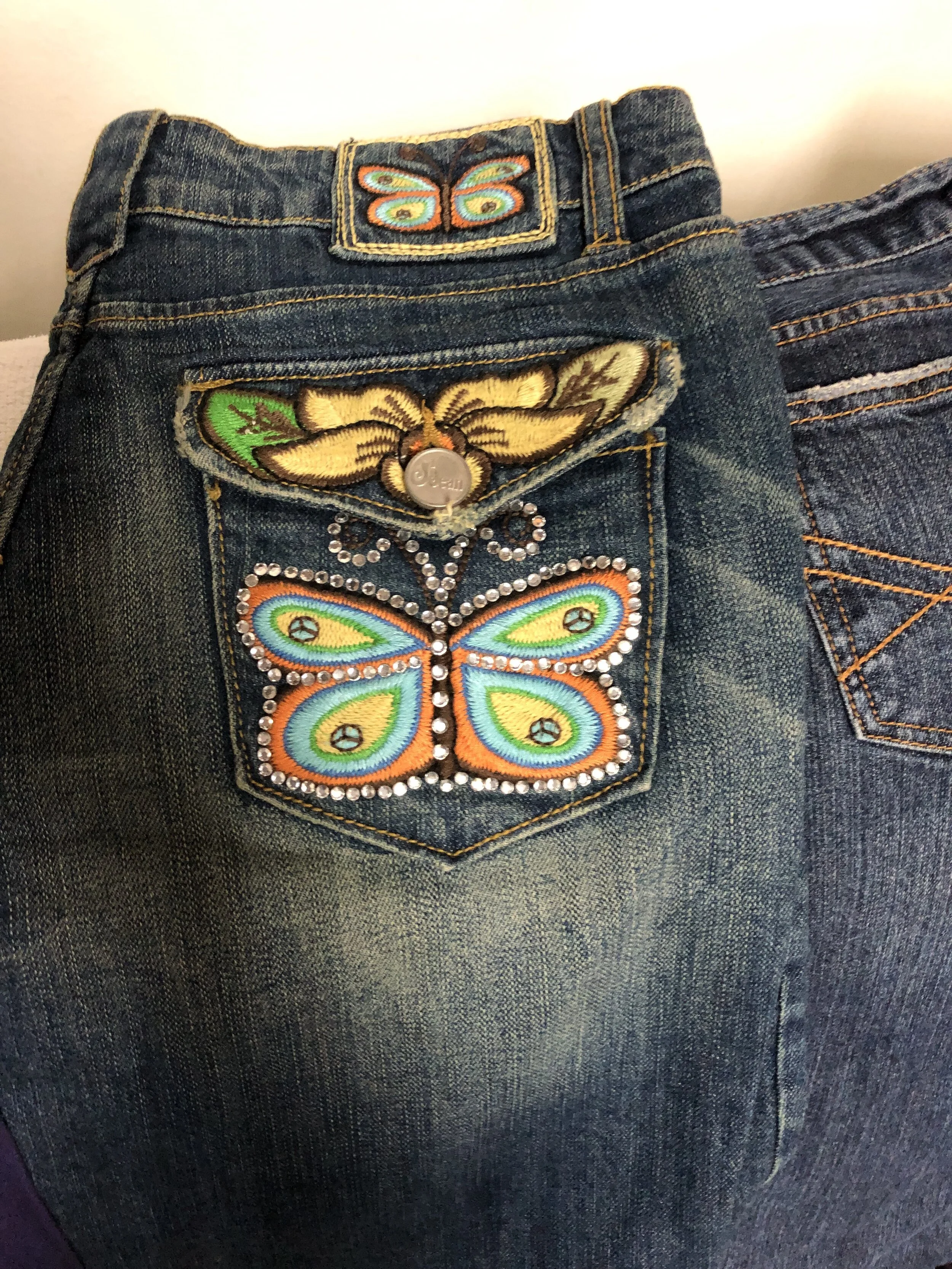 Jeans with Butterfly Pattern on Pockets