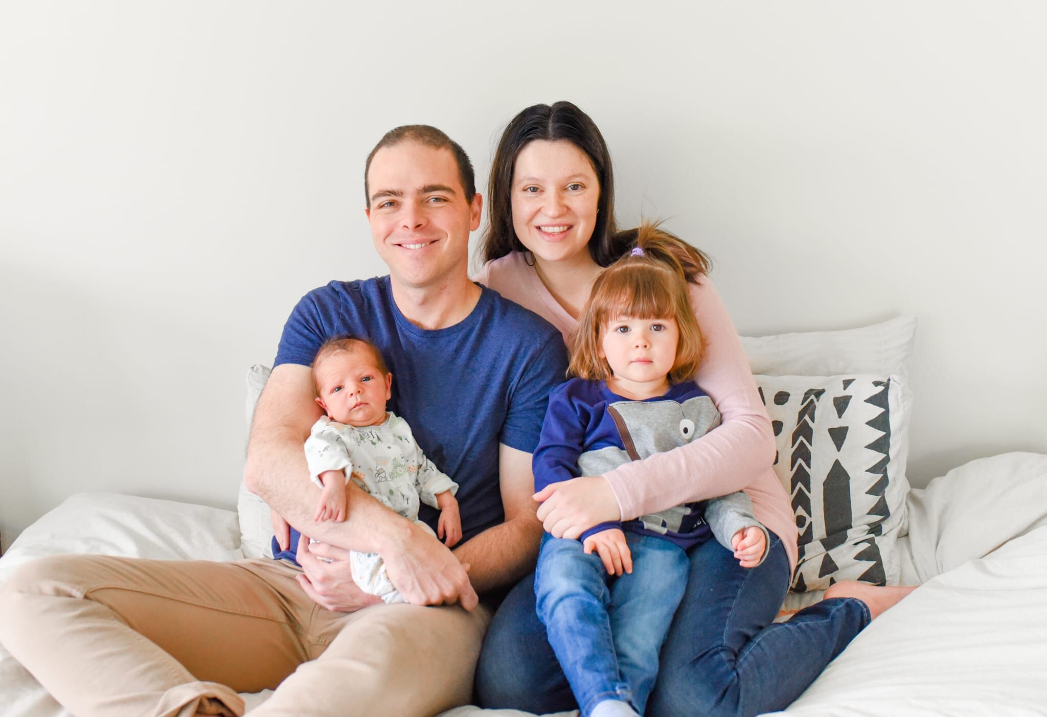 Rockville Maryland Newborn Photographer - family on bed