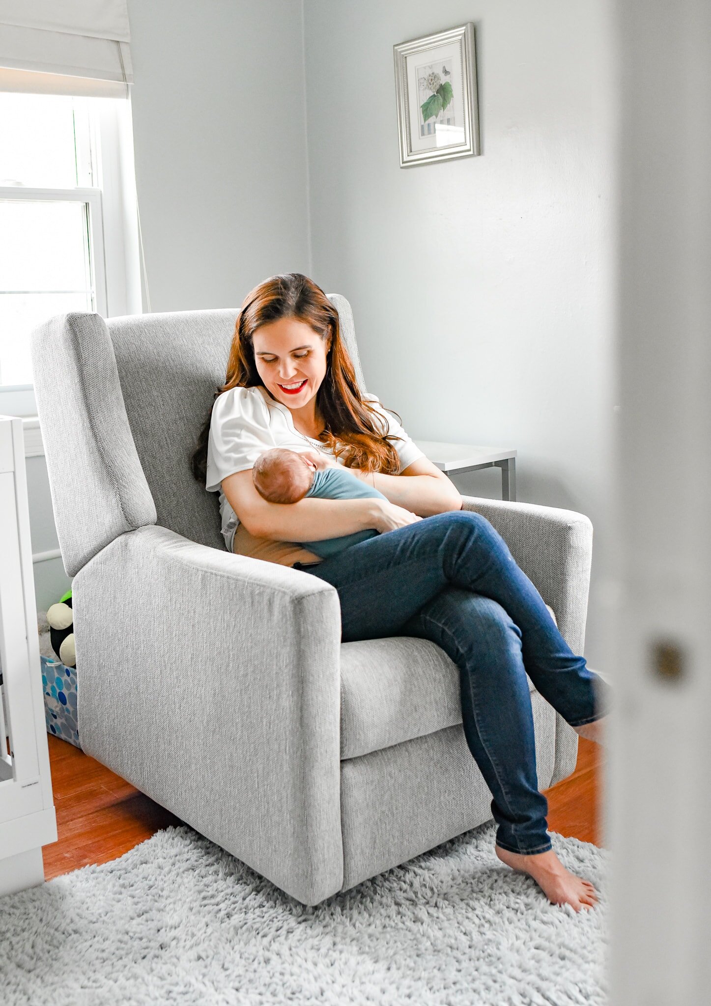 Silver Spring Maryland Newborn Photoshoot - mom in nursery with baby