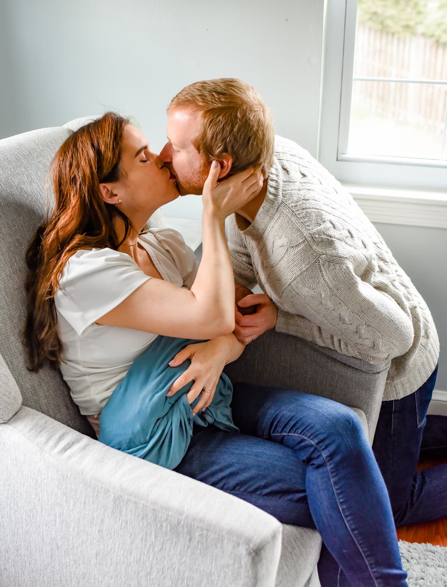 Silver Spring Maryland Newborn Photoshoot - mom and dad kissing in nursery