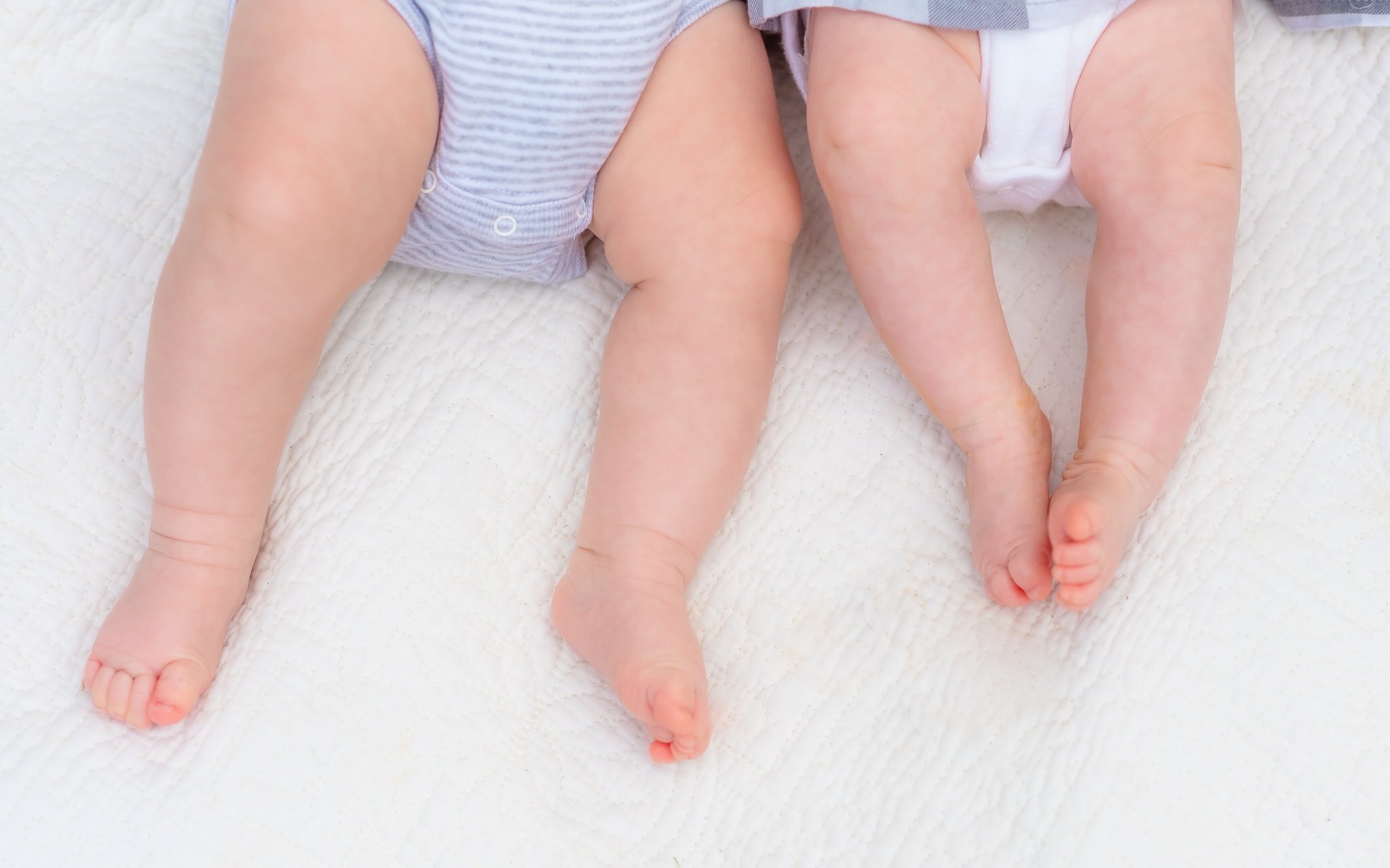 Bethesda Maryland Newborn Photoshoot - close-up of twin babies feet