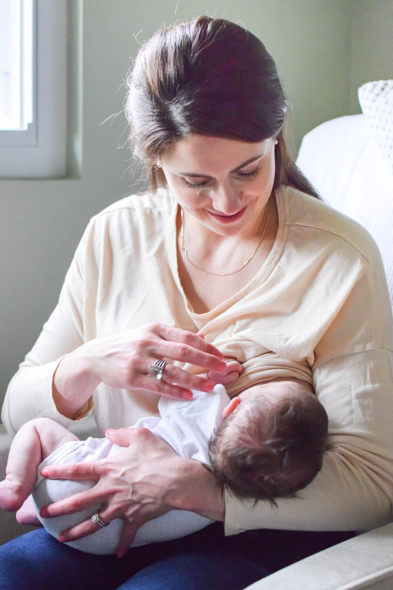 Maryland Newborn Photographer - mom nursing baby