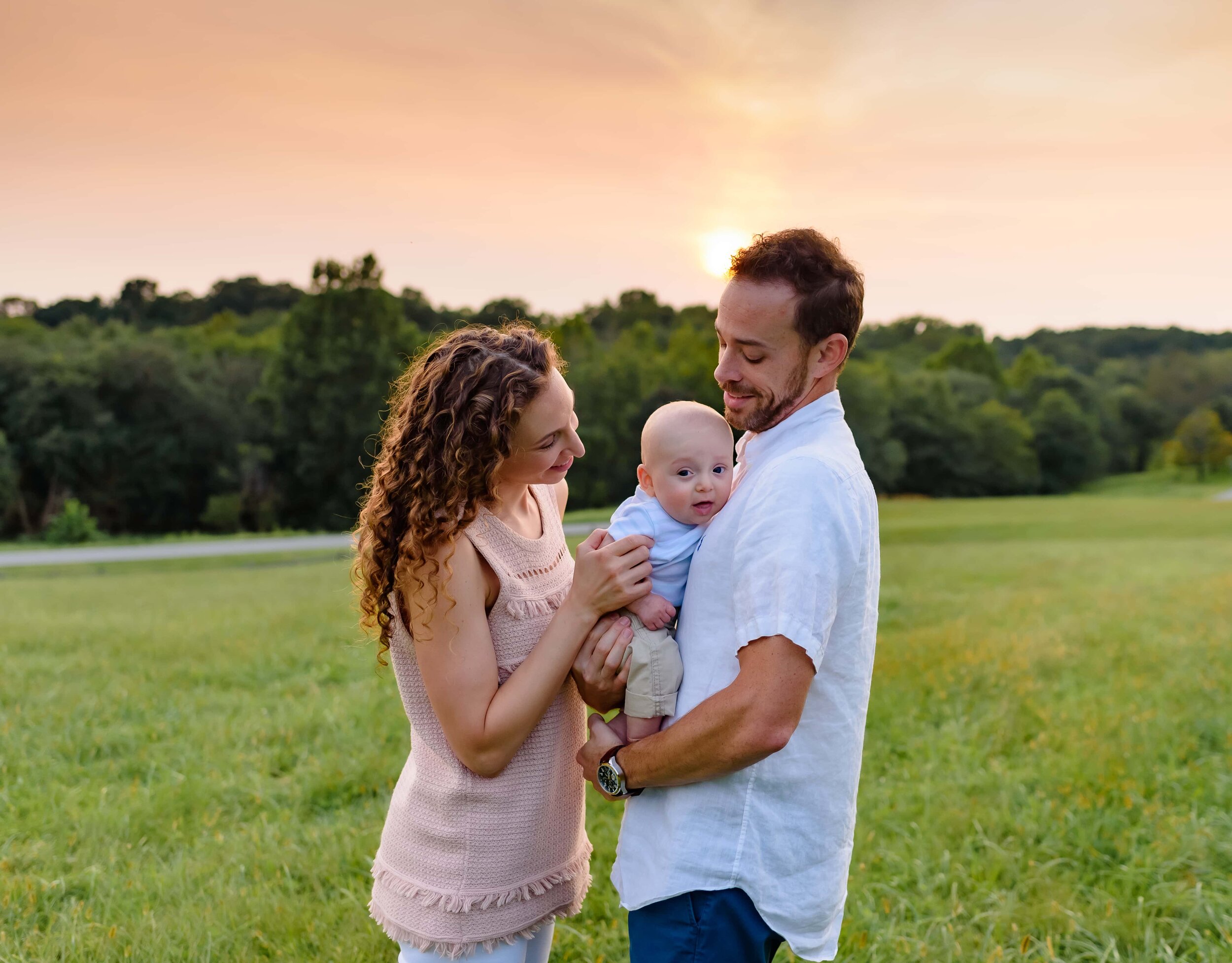 Maryland Newborn Photography - family in a field at sunset