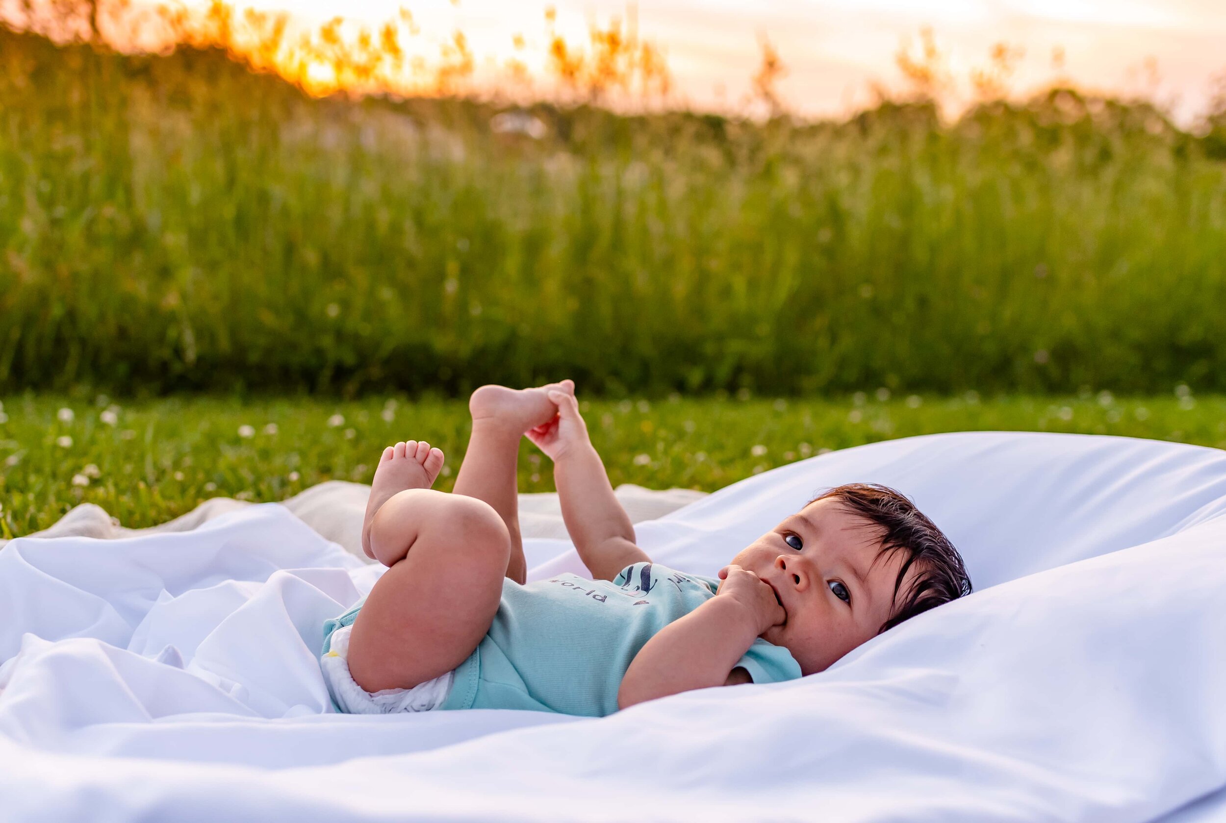 Maryland Newborn Photography - baby on a blanket at sunset