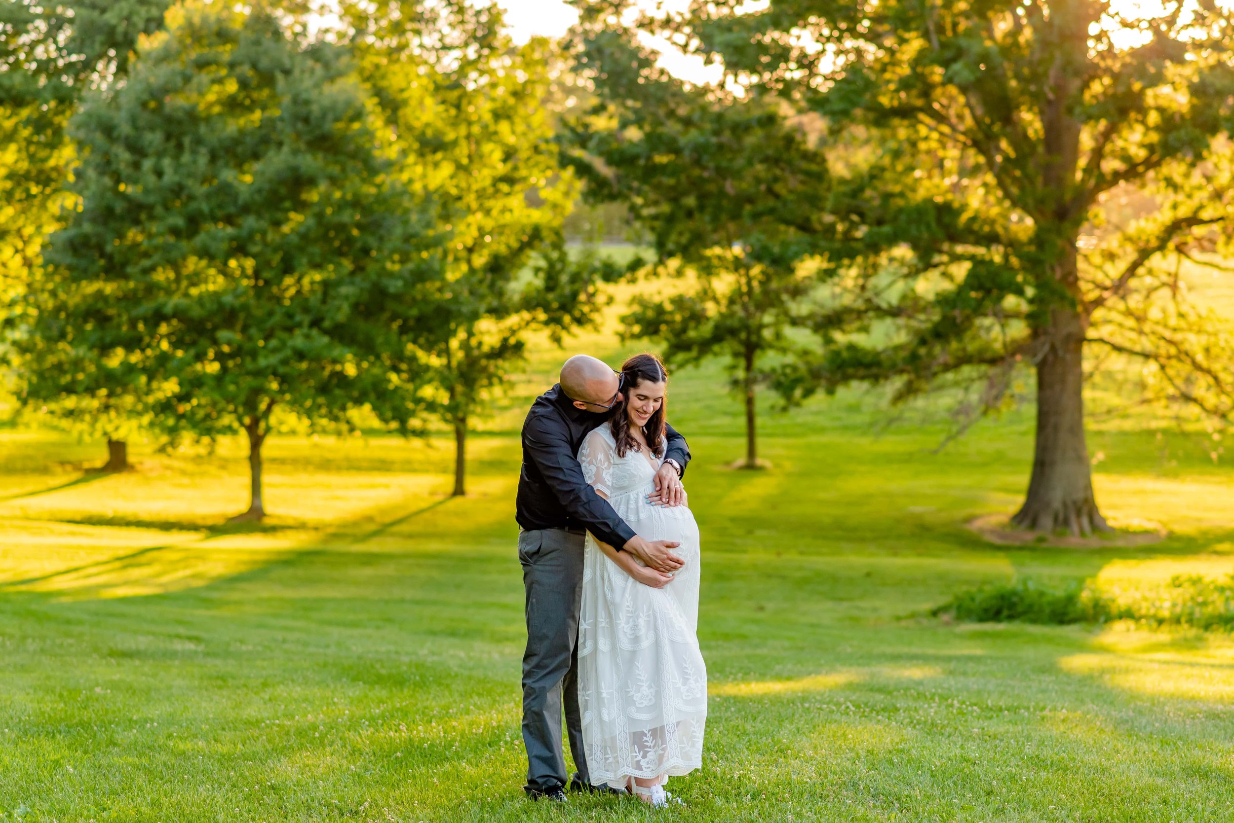 Maryland Maternity couples photo of man and woman standing in a field