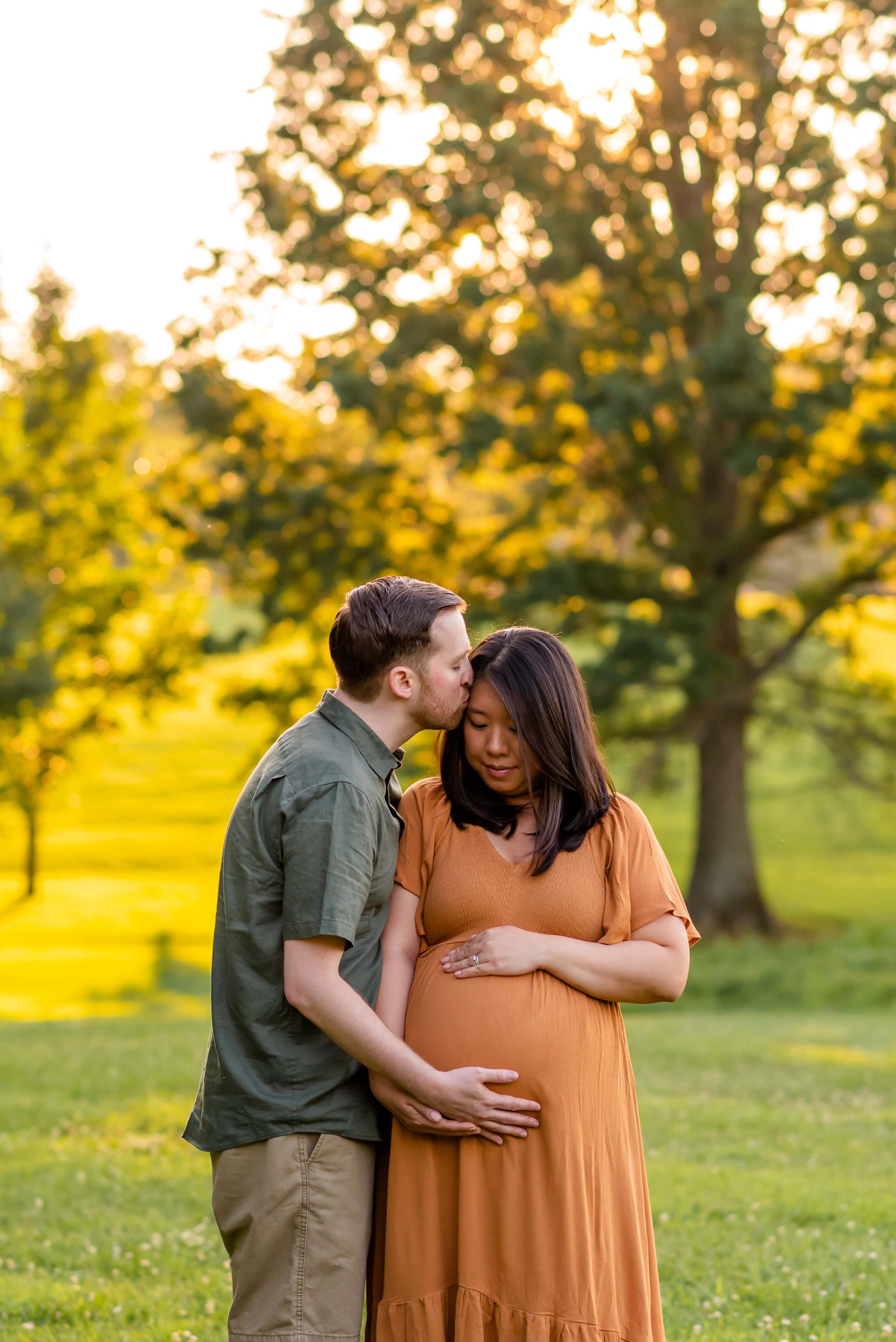 Maryland summer maternity photo of couple at sunset