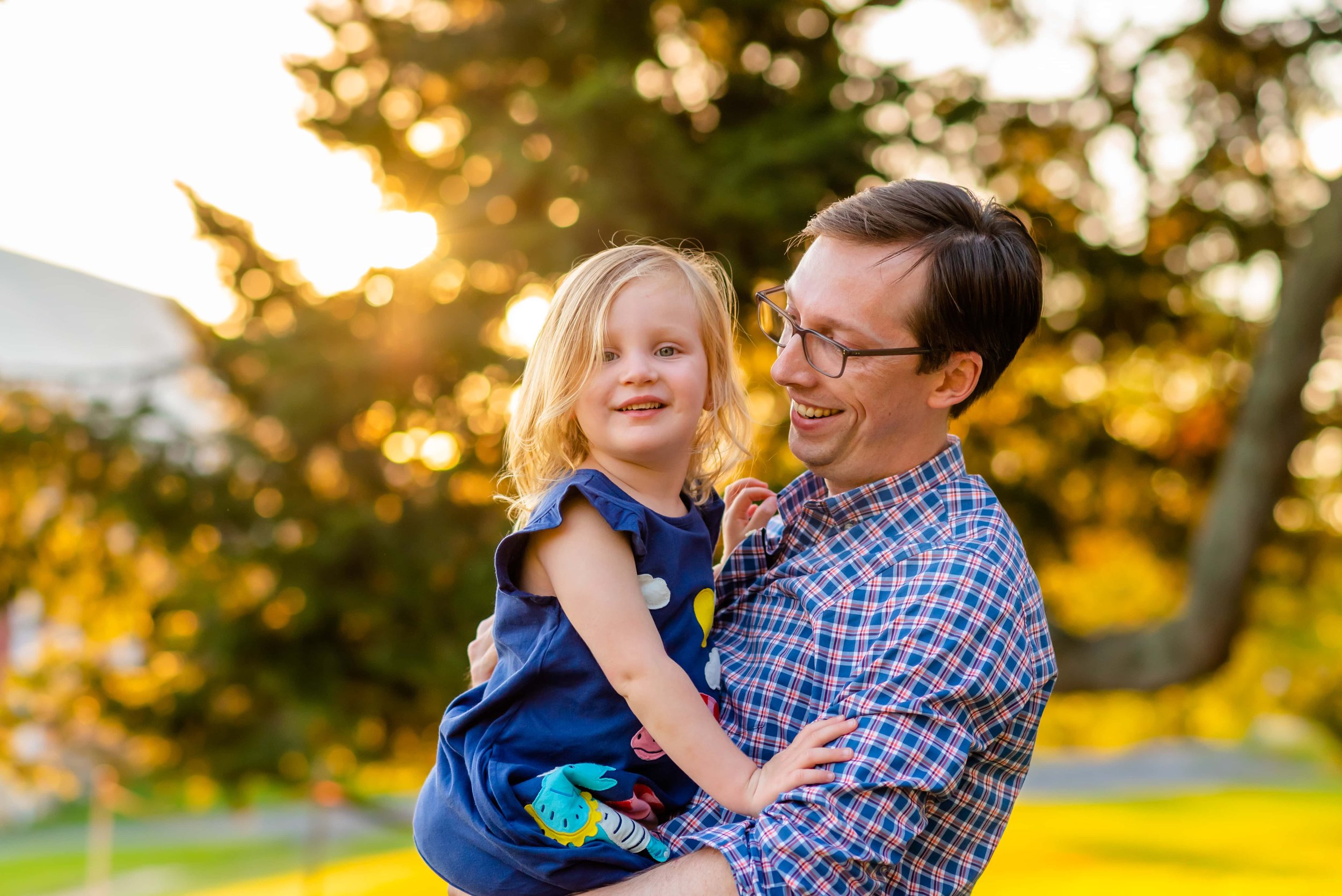 Summer family photo of dad and daughter