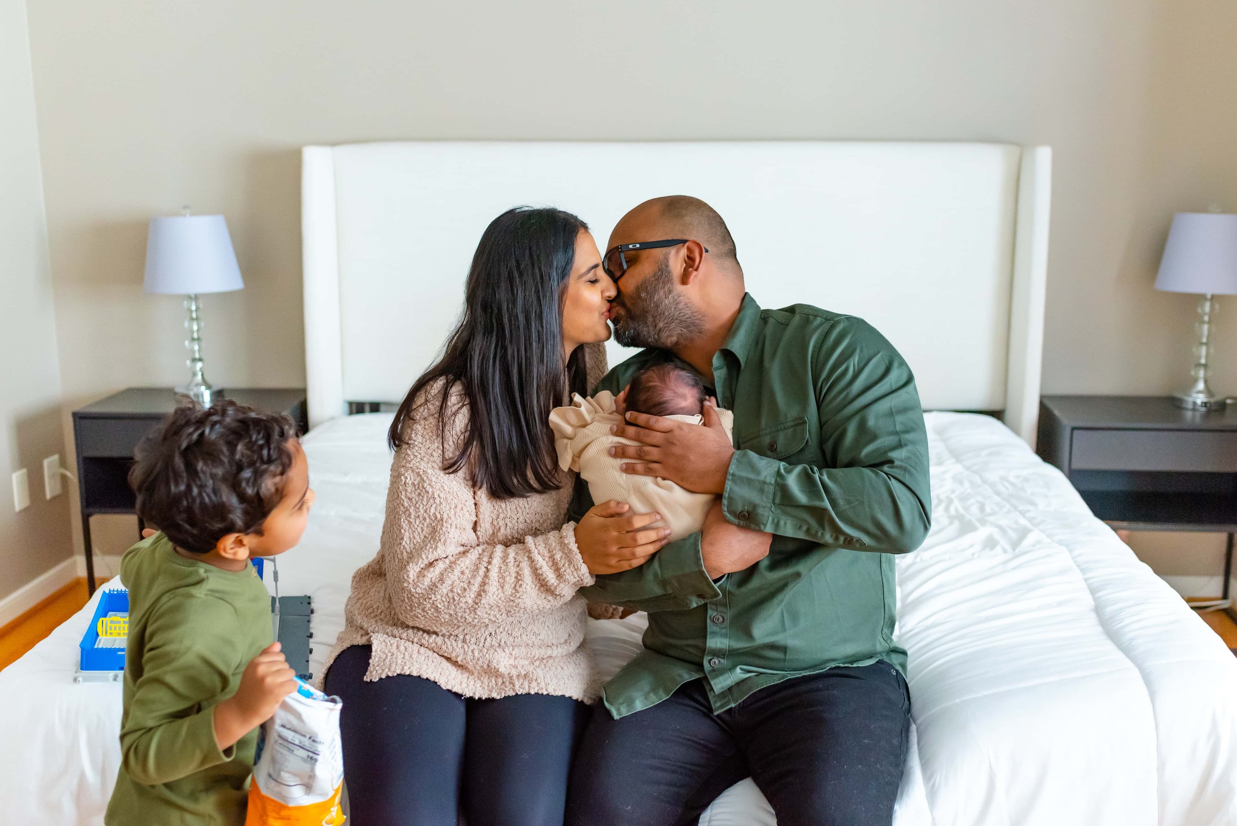 Maryland Newborn Photography - Family on a bed 