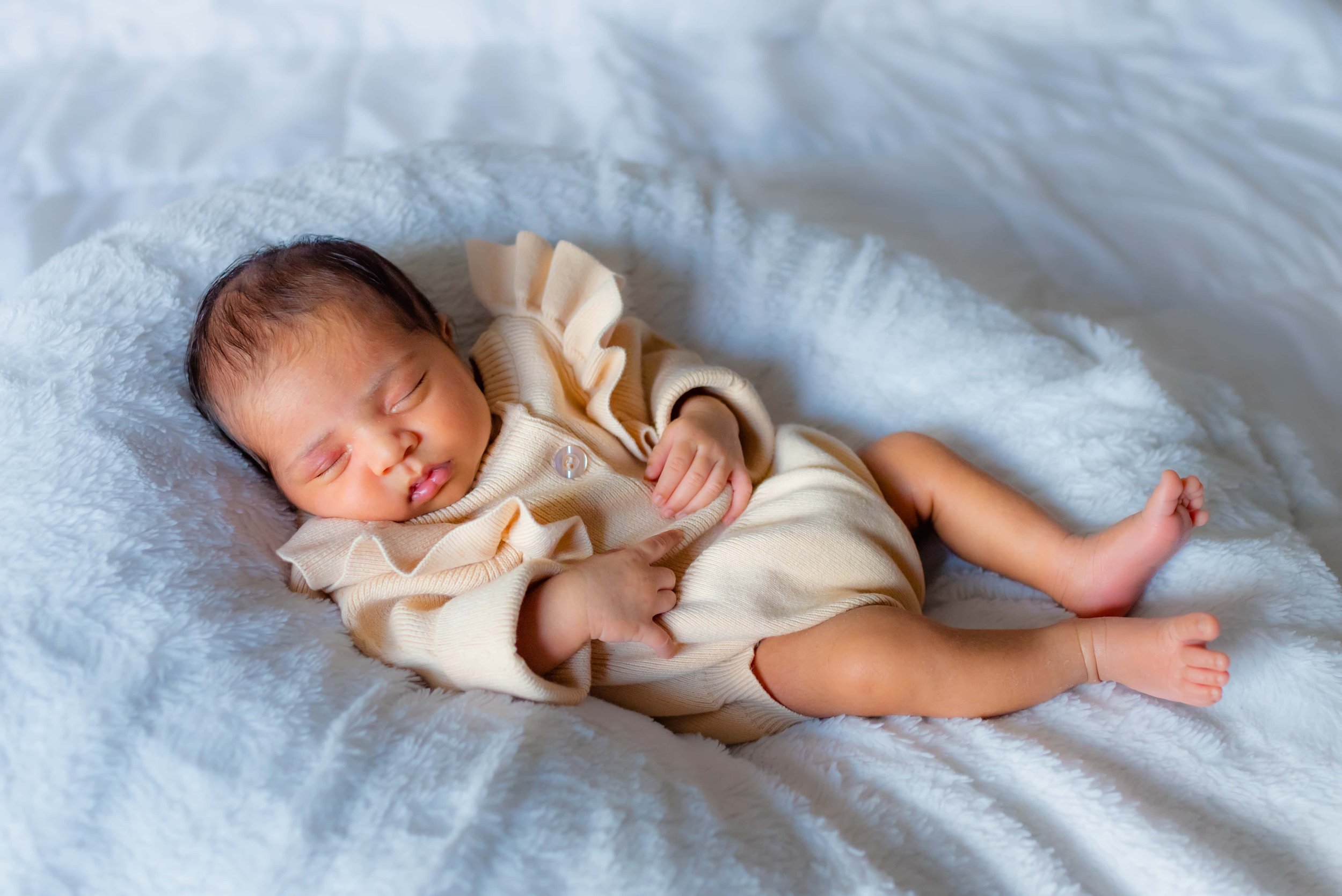 Maryland Newborn Photography -  Over head shot of a sleeping newborn baby 