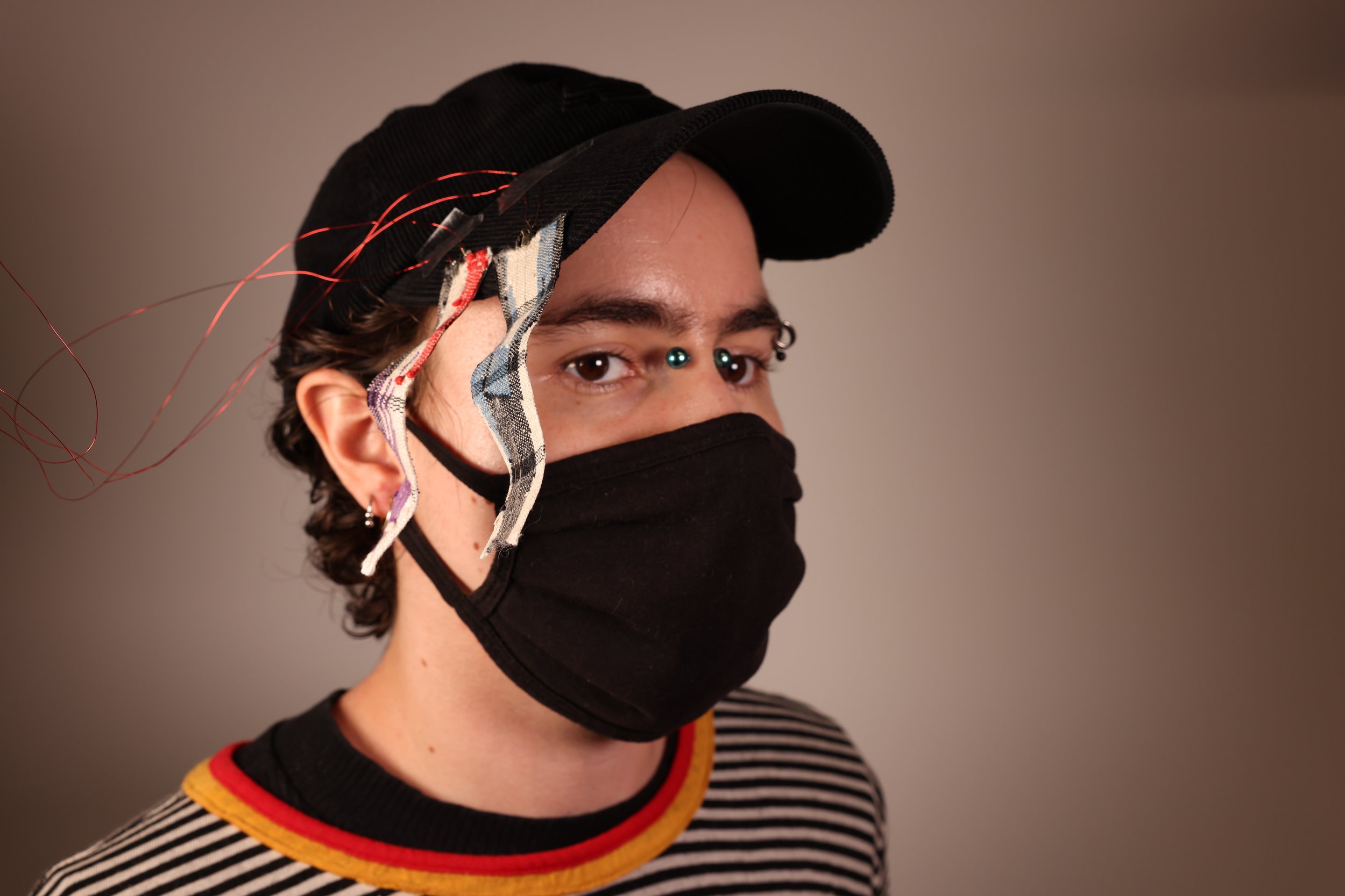  A person wearing a hat with deformable fringes. ((Photo: Hybrid Body Lab) 