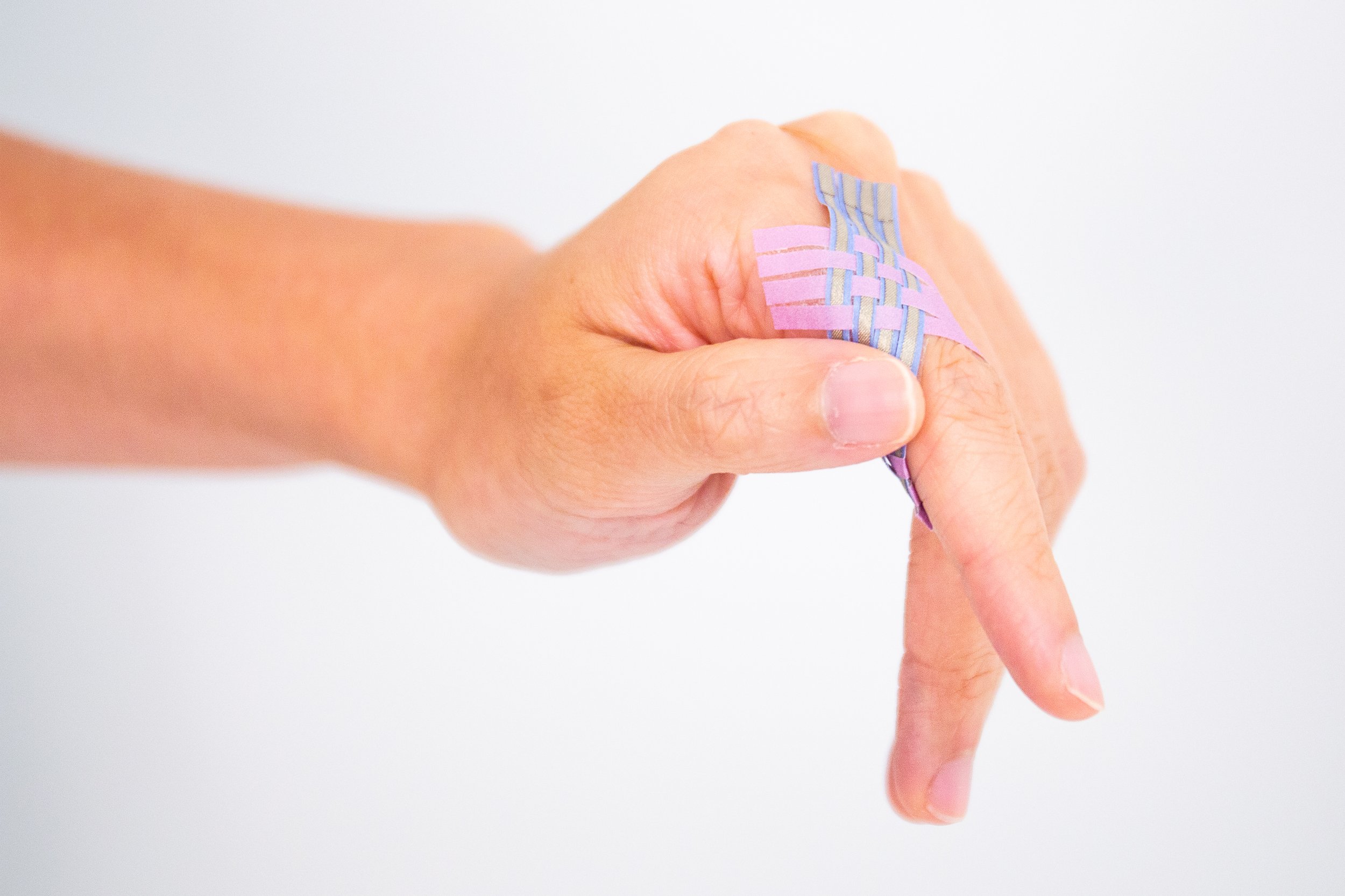  Example of SkinPaper interface: 3D Tubular Finger Touch Sensing Slider.  (Image Credit: Hybrid Body Lab) (License: CC BY-NC-SA 4.0)   