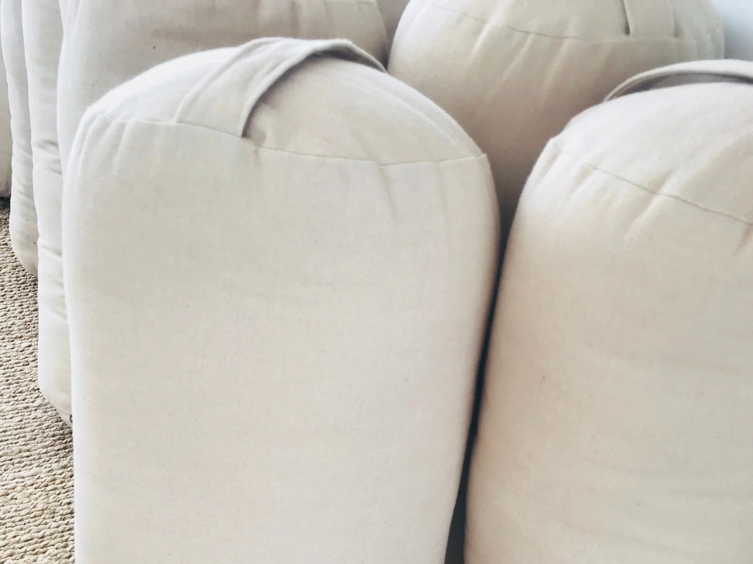 Bolsters   We have a few handmade, natural linen bolsters available.  These are the beautiful bolsters that we use in the studio. They have a removable outer liner that can be machine washed.  These are kept off-site so please do email us to reserve one.   Linen Bolster $135