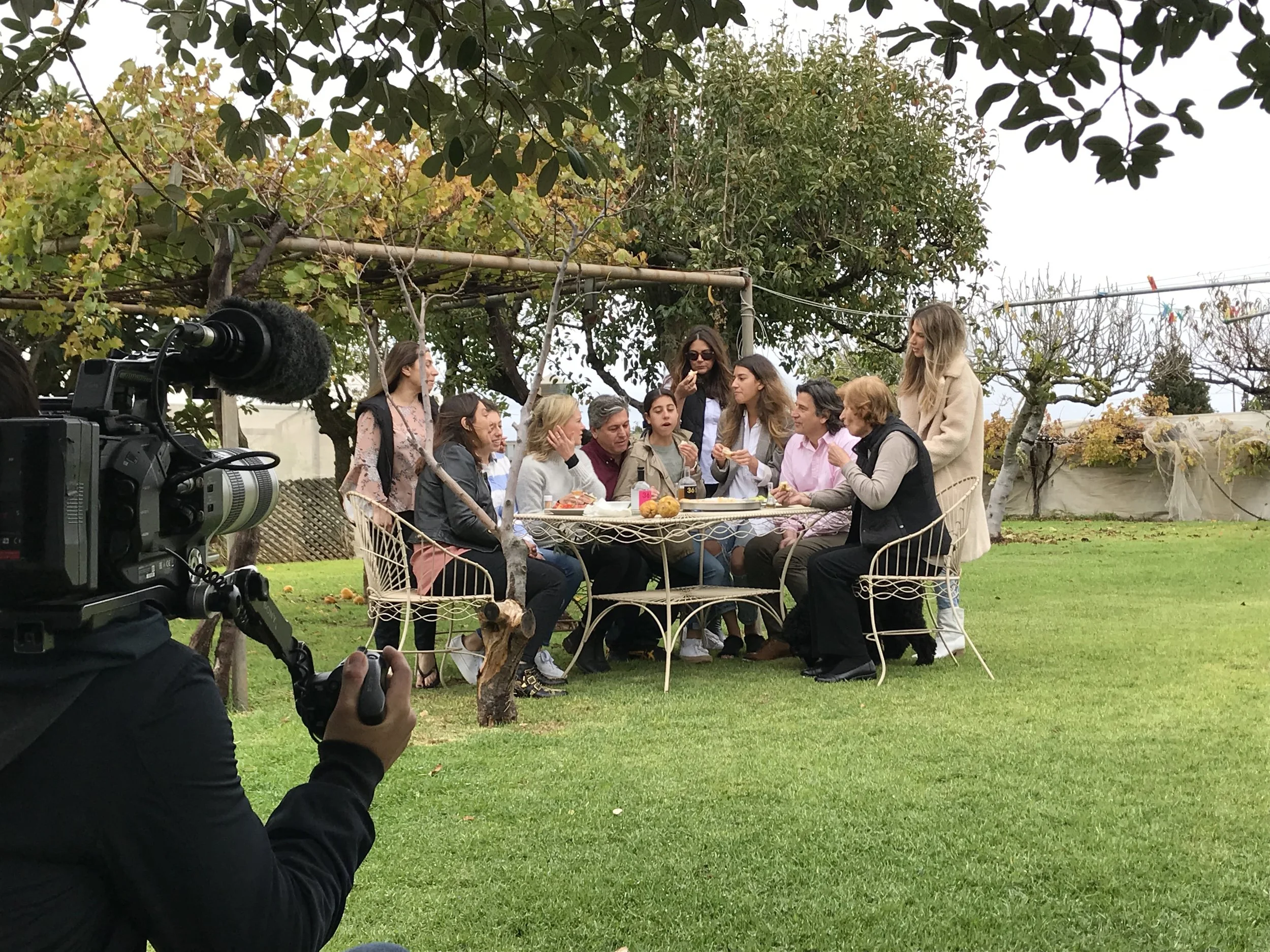 The Lioulios family share a meal with Justine Schofield.
