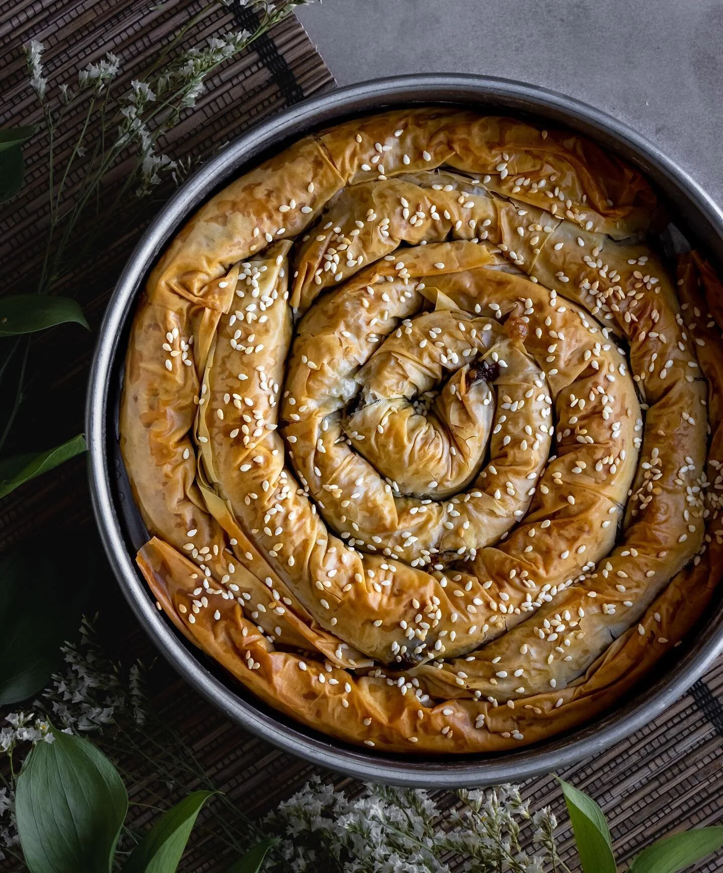 Spanakopita! My take on the classic Greek spinach pie packed with tons of greens: spinach, kale, dill, parsley, and mint. In place of feta I use a combination of tofu, nutritional yeast, capers, and kalamata olives for a cheesy, tangy, and salty bite