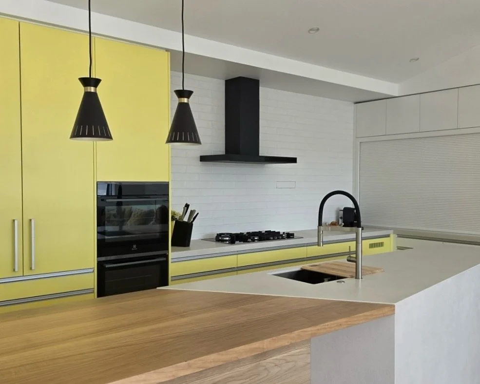 A true Yellowfox yellow moment ✨ This Glendowie renovation brings back the same bold yellow from the original kitchen, mixed with a love for Scandi style. With a pilot in the home, the island design was inspired by an aircraft wing and shaped to stay
