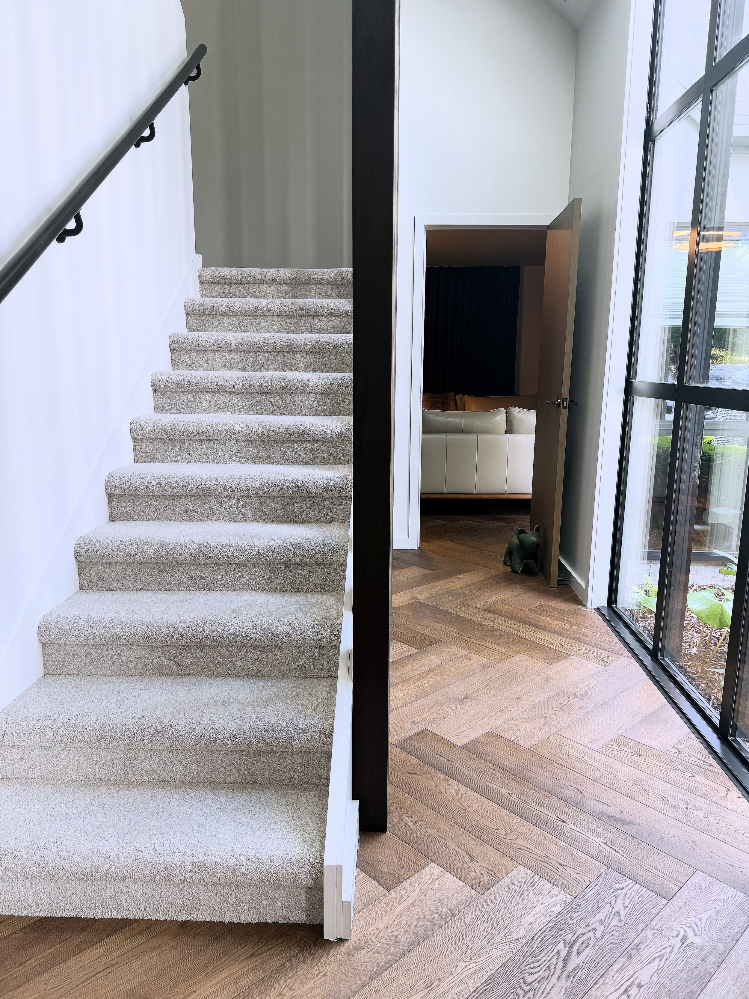 Our Tauranga &amp; Hamilton designers visited their recently completed River Oaks renovation, and took snaps of a few of the stunning details. Rich herringbone oiled oak flooring by @creativeflooringnz , oak veneer doors with signature brass handles 