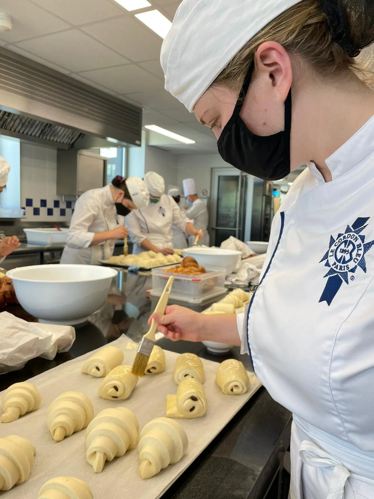 me buttering croissants.jpg