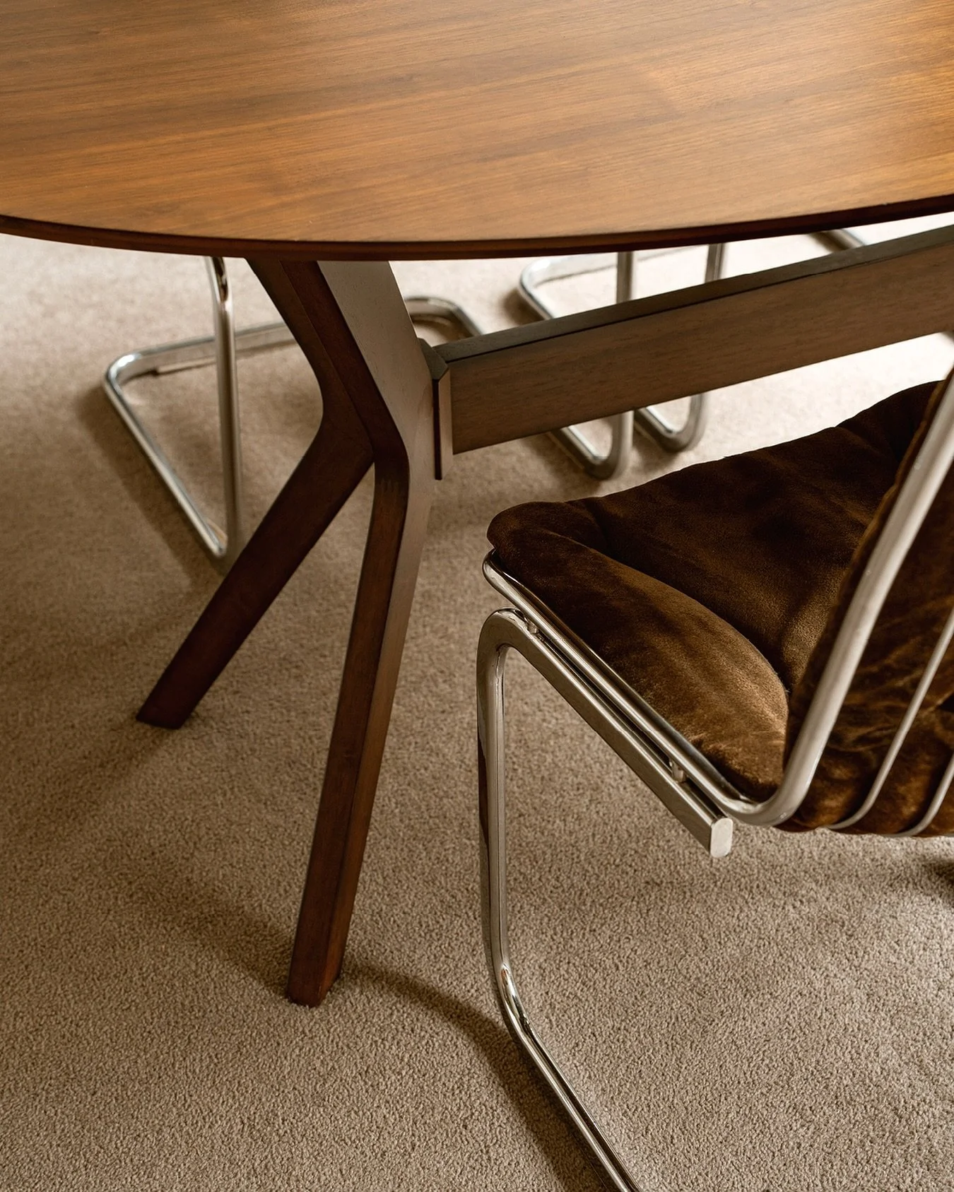 Detail shots of crossed legs 
~ Chrome lines tracing soft textures
~ Curves meeting angles with quiet confidence

Shot by me