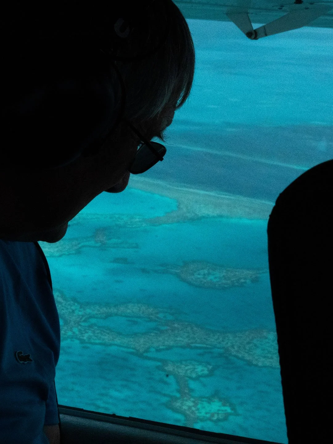 Scenic aerial ocean view from helicopter over tropical reef