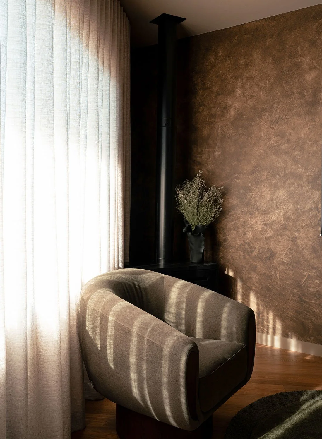 Photography of an interior 70s style in Merimbula, view of an armchair
