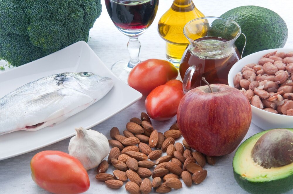 Nuts, garlic, fatty fish, fiber rich fruits, olive oil, and avocado are heavy in HDL.