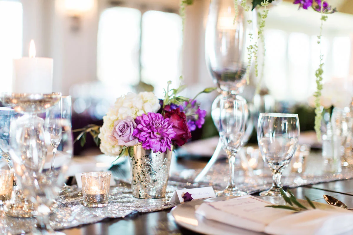 weddingreception-silverpurpletableesetting-purplewhiterosecenterpiece.jpg