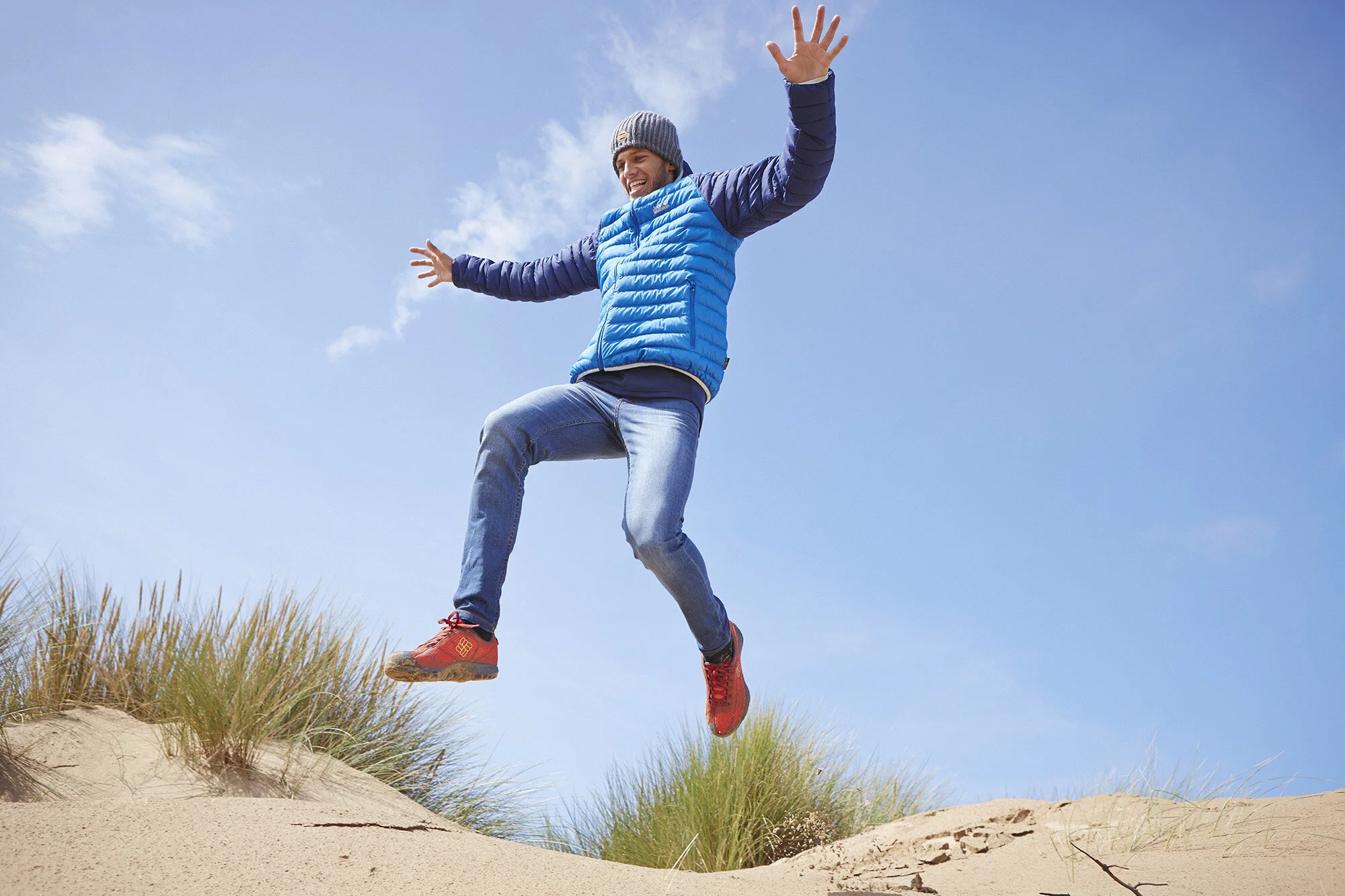 beach-day-dunes-winter-holiday-christmas-break-man-jumping.jpg