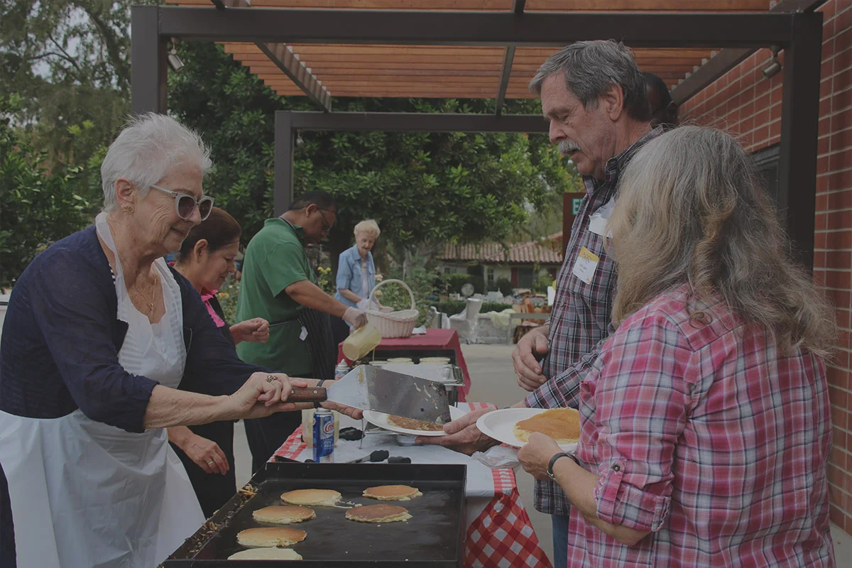 MVGH volunteers serving food.jpg