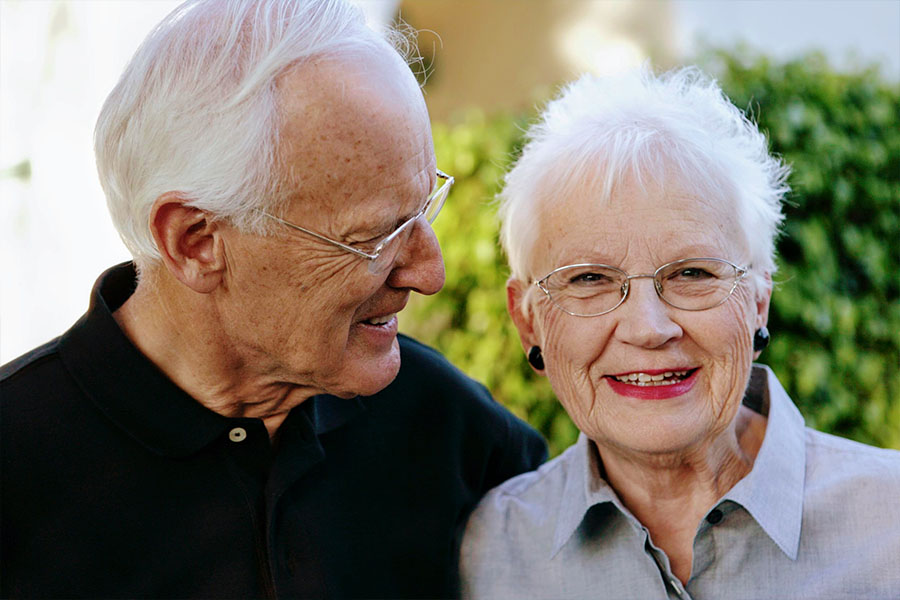 elderly couple smiling.jpg