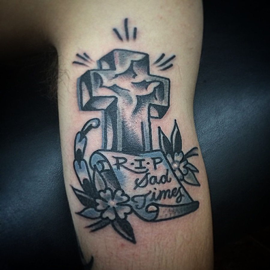 Troy Peace Cross Tattoo.jpg