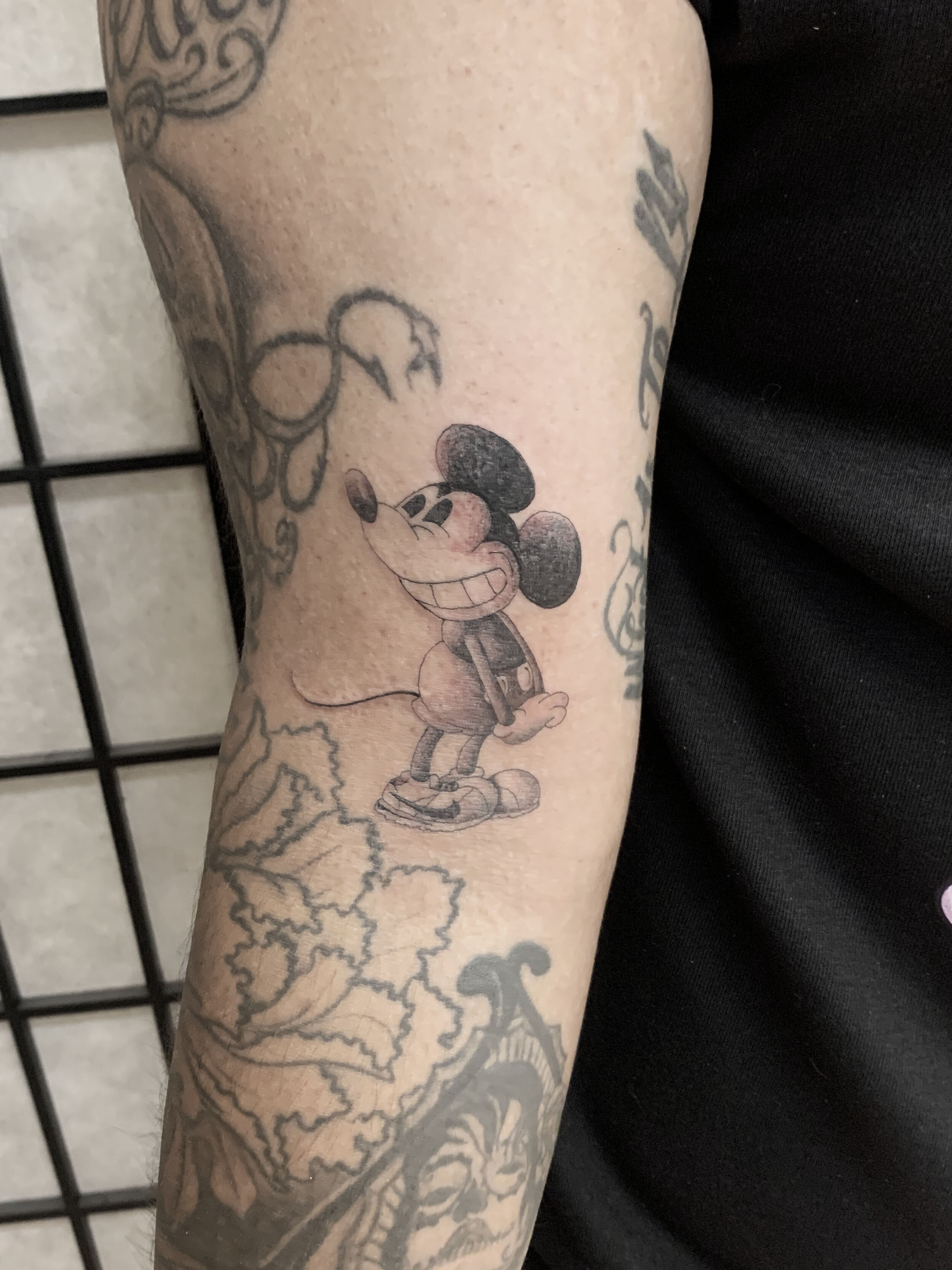 JOSE ARAUJO MARTINEZ CLASSIC TATTOO FULLERTON MICKEY MOUSE TATTOO.jpg