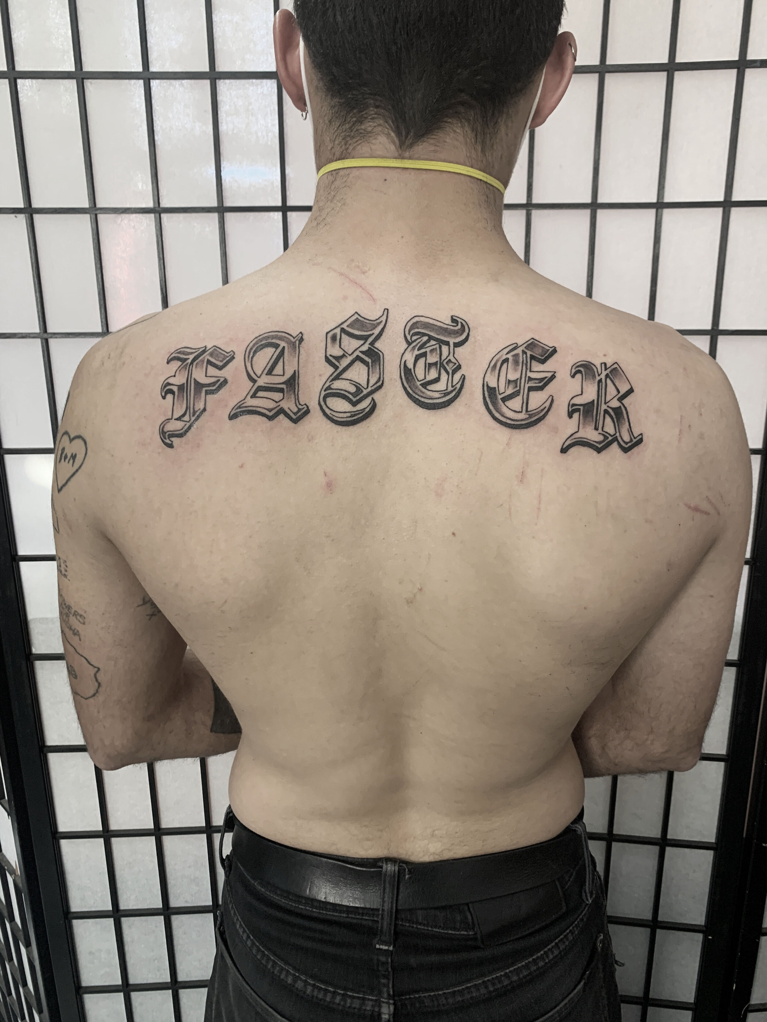 Small Stomach Lettering tattoo at theYoucom