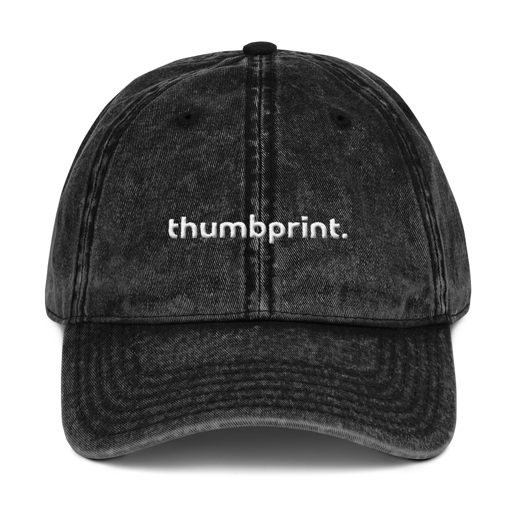 thumbprint-WHITE_mockup_Front_Flat_Black.png