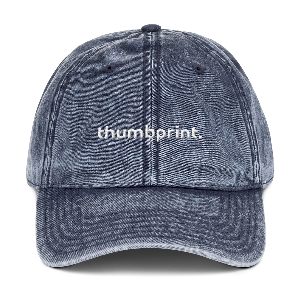 thumbprint-WHITE_mockup_Front_Flat_Navy.png