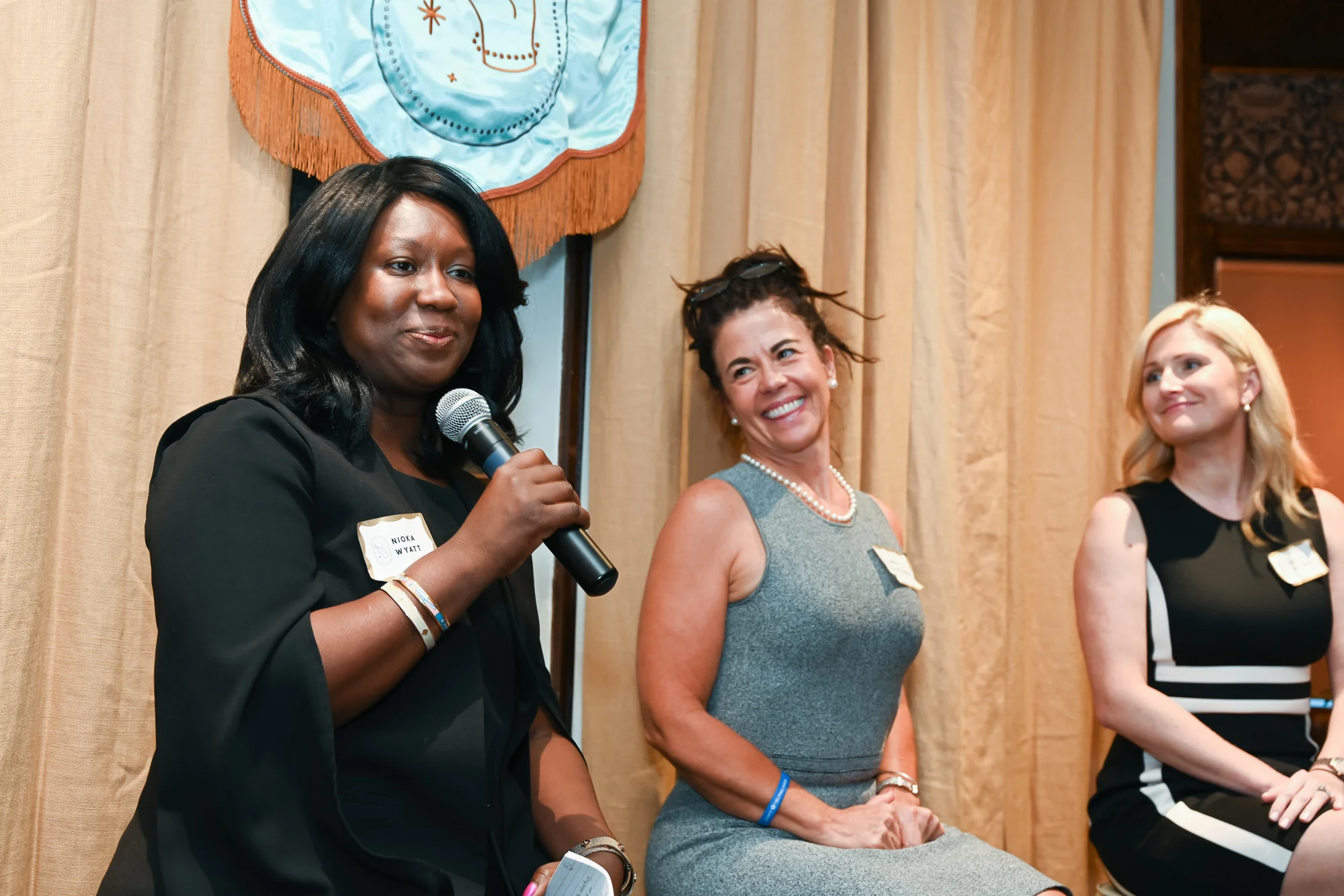 Speaking: Nioka Wyatt, Linda Schellenger, and Kelly Stillwell.