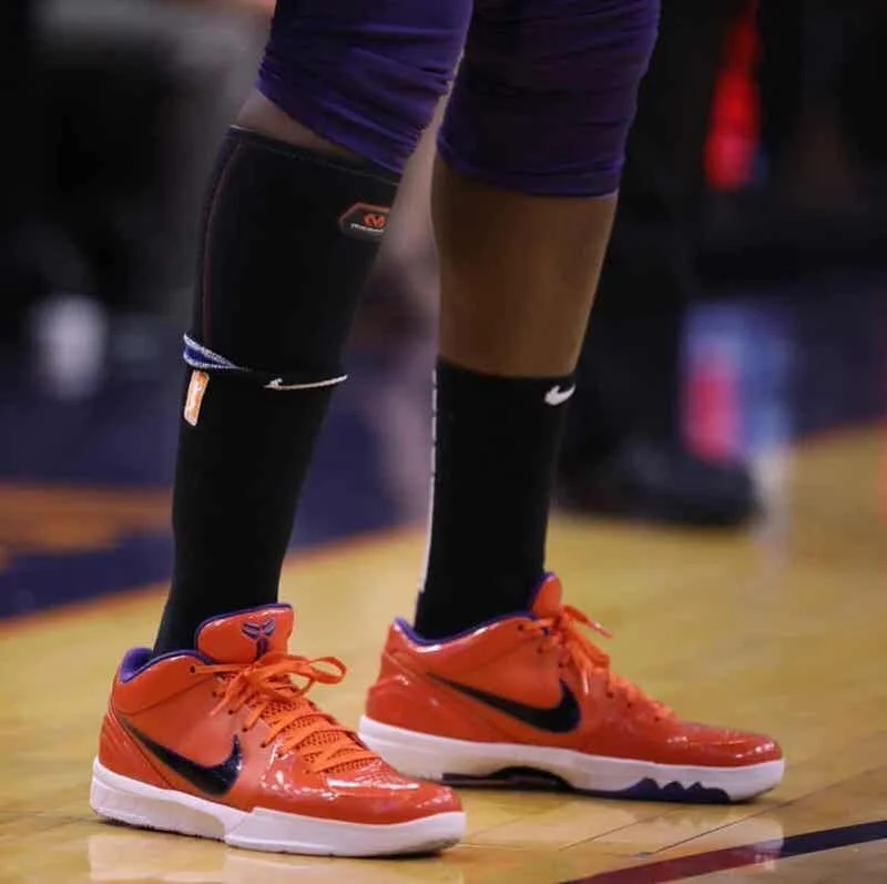 essence-carson-undftd-x-nike-zoom-kobe-4-protro-team-orange.jpg