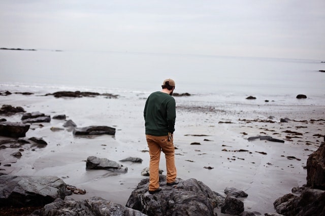 WELLIVER-beach-coast-man-walking-alonejpg-min.jpg