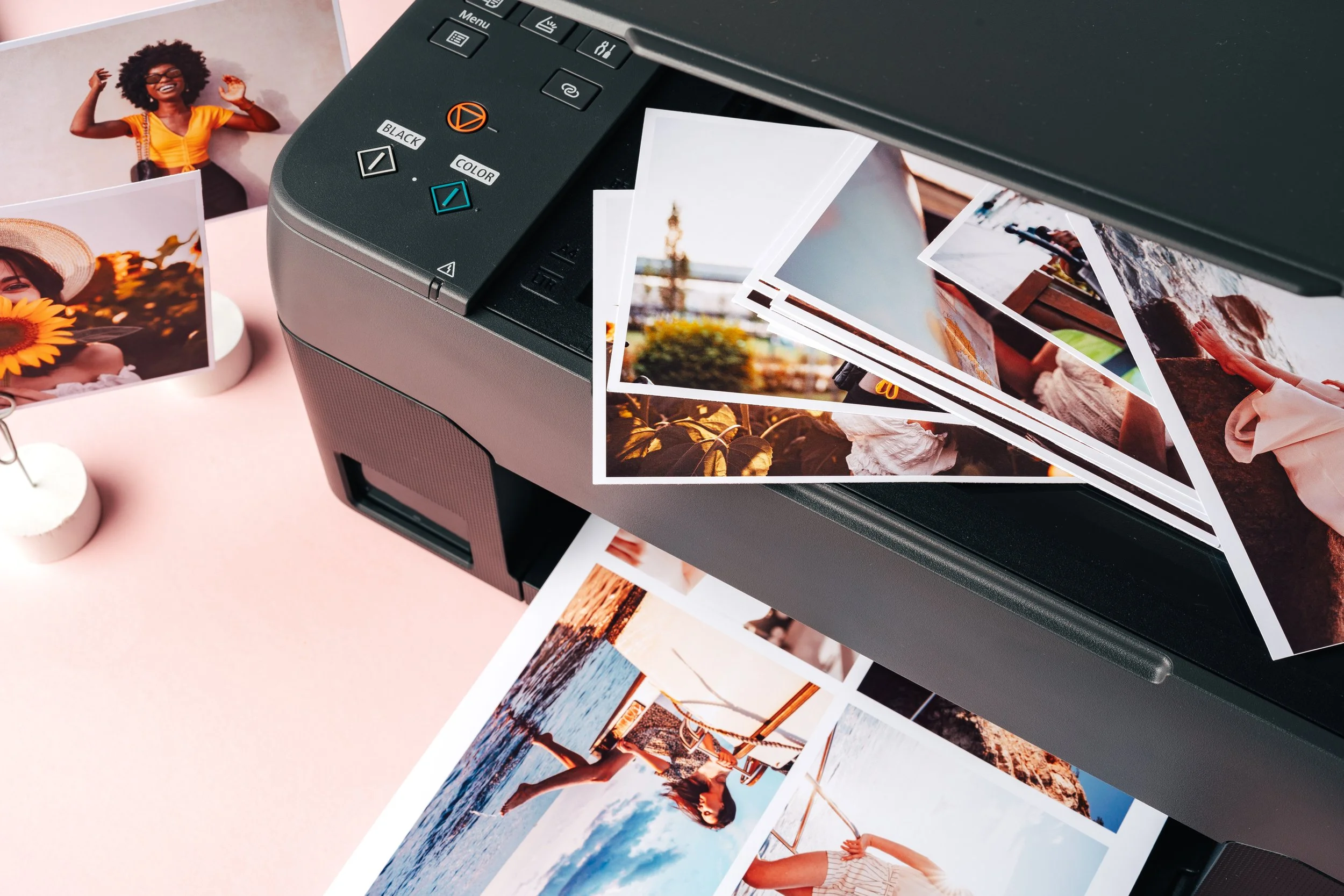 modern-laser-printer-printing-color-photos-women-close-up.jpg