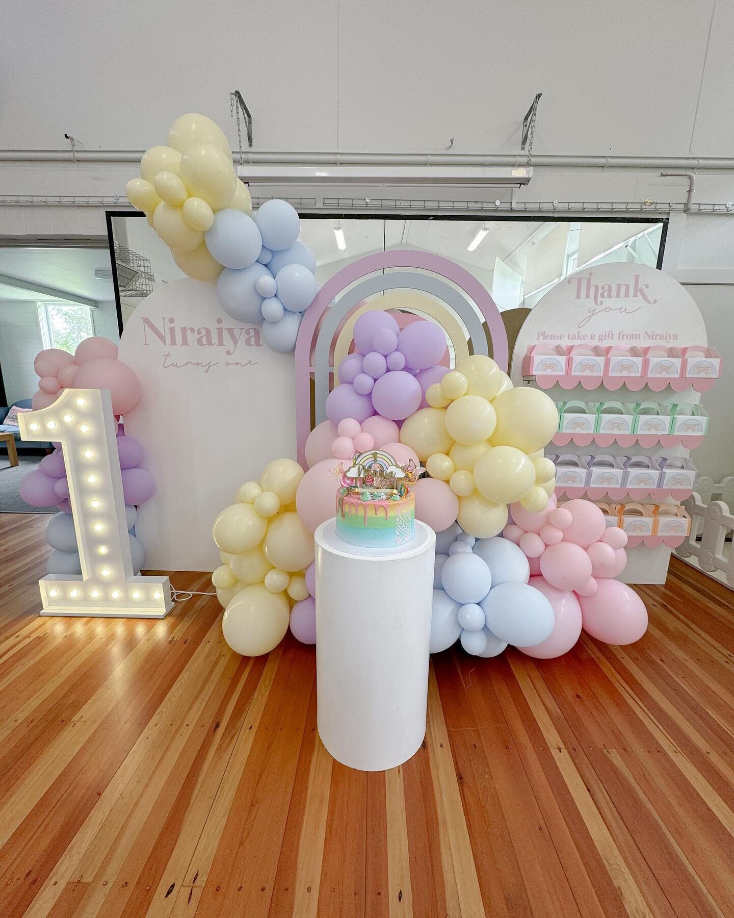 Our pastel rainbow themed setup. 🌈 💜🩷

This setup has been so popular lately . 
Our pastel rainbow arch can be paired with either a white, pink, lilac or blue backdrop and comes with a light up number to make a gorgeous pastel themed 1st backdrop.