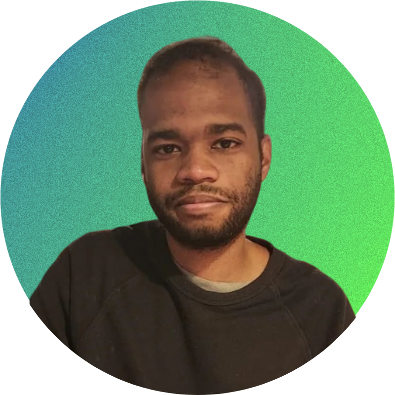 Man with short hair and beard, wearing a dark sweater, in front of a gradient blue and green background.