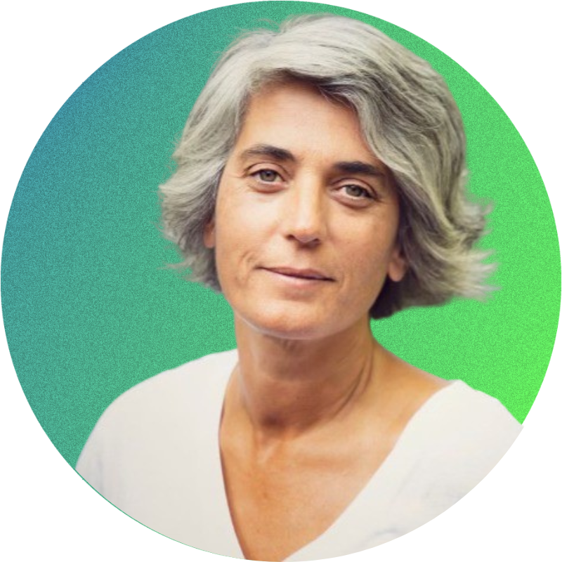 A person with short gray hair wearing a white shirt against a gradient green background.