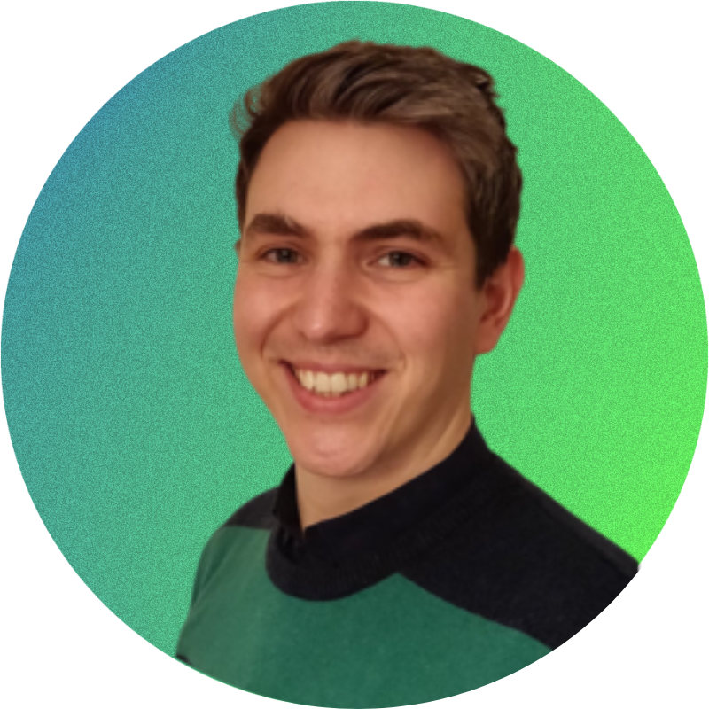 Smiling person with short brown hair wearing a green and dark blue sweater, against a green gradient background.